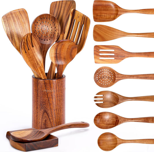Set of wooden kitchen utensils including spoons, spatulas, and a ladle in a wooden holder.